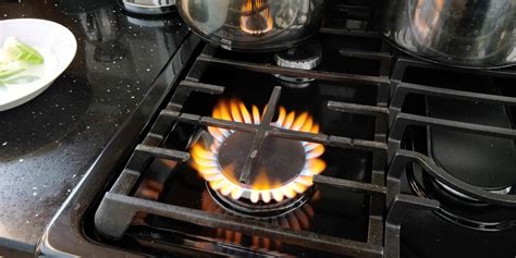 orange flame on all burners